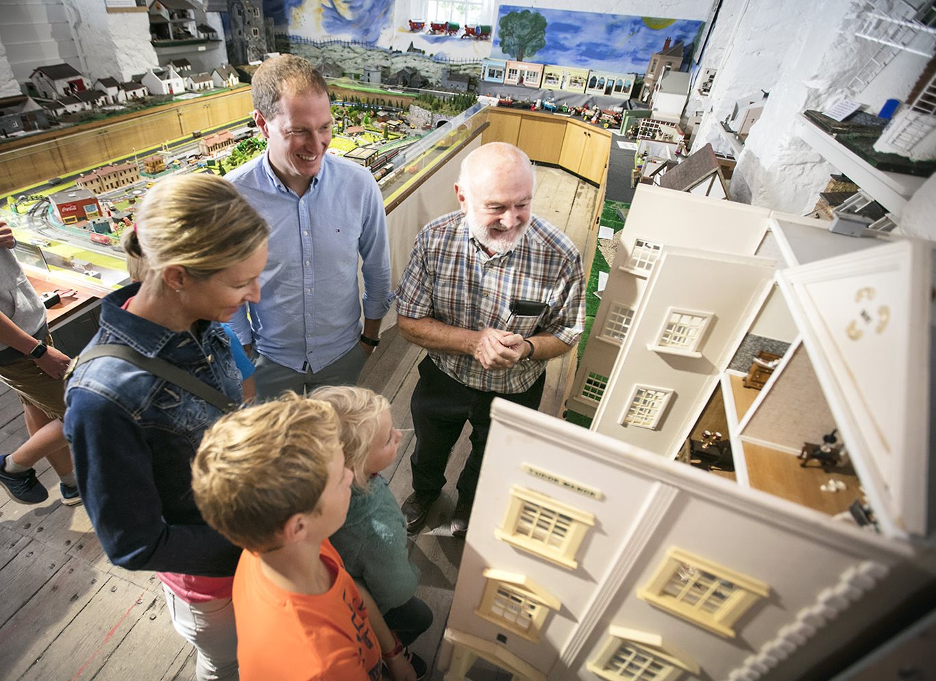 People having a tour inside the Flax Coffee Shop and Visitor Centre